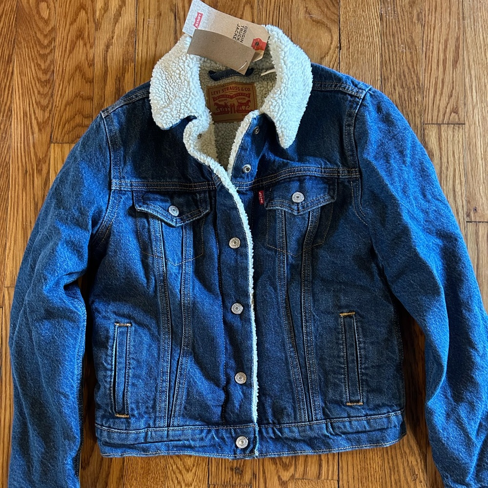 Women’s XS Levi denim jacket with fleece lining.